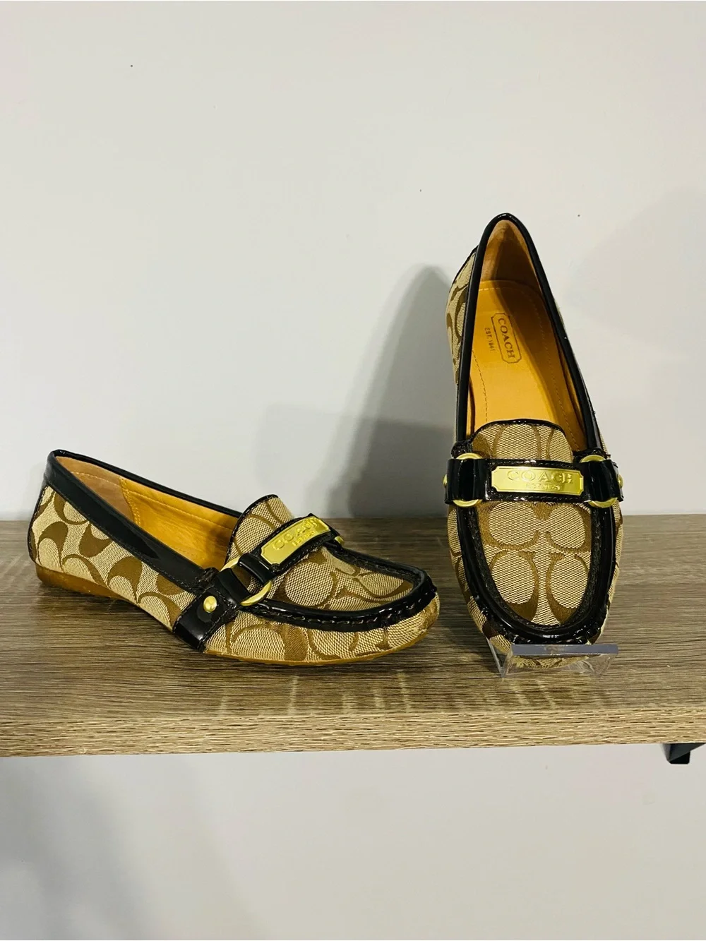 Coach Tan Signature Canvas Loafers with Black Trim and Gold Hardware